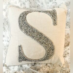 Silver beaded decorative initial S pillow